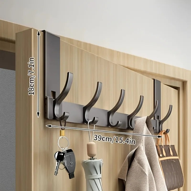 Bathroom Storage Space Clothes And Towels Are Hung Behind The Bathroom Door For Easy Installation In The Space Above The Door