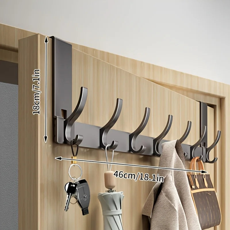 Bathroom Storage Space Clothes And Towels Are Hung Behind The Bathroom Door For Easy Installation In The Space Above The Door