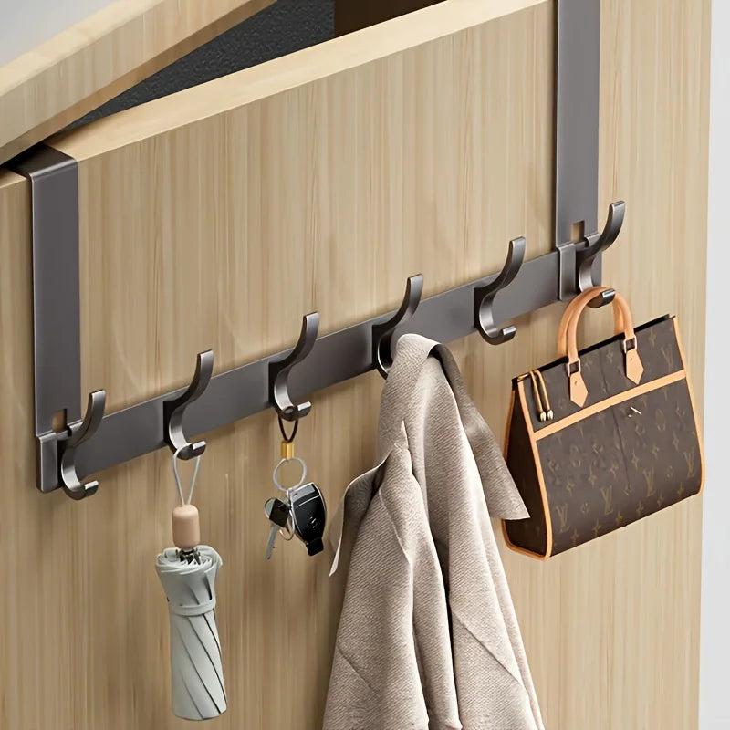 Bathroom Storage Space Clothes And Towels Are Hung Behind The Bathroom Door For Easy Installation In The Space Above The Door