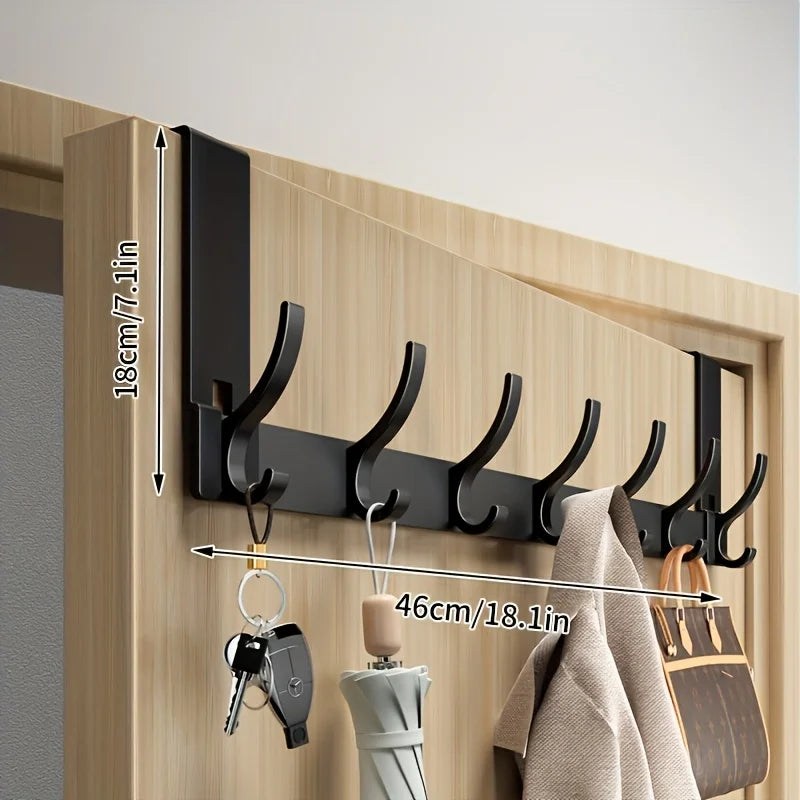 Bathroom Storage Space Clothes And Towels Are Hung Behind The Bathroom Door For Easy Installation In The Space Above The Door