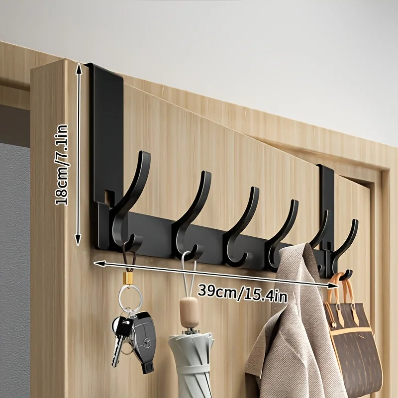 Bathroom Storage Space Clothes And Towels Are Hung Behind The Bathroom Door For Easy Installation In The Space Above The Door